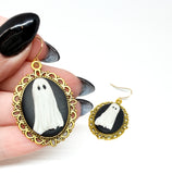 Gold-Framed Ghost Dangles